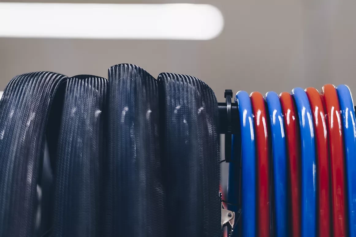 Cables for high voltage charging, black, red and blue colours.